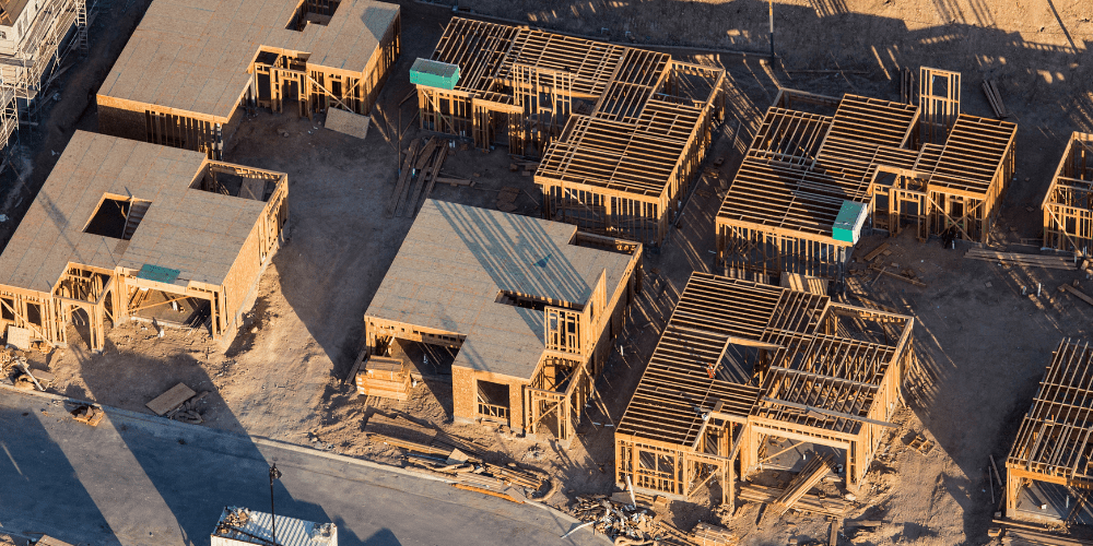 New Construction Driving HVAC Business Trends in 2025 Aerial view of multiple new homes under construction, representing HVAC business trends tied to housing growth and contractor opportunities.