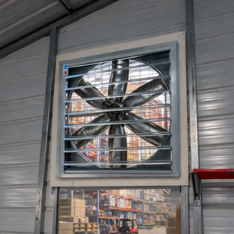 ACIQ cabinet wall exhaust fan installed in warehouse wall for industrial ventilation and air exhaust