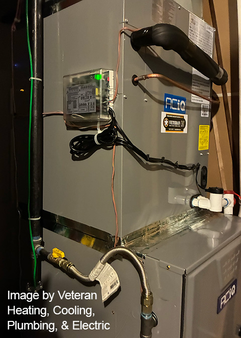 indoor installation for Veteran heating cooling and plumbing aciq dealer of the month