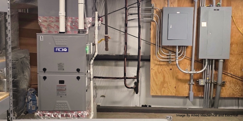 ACiQ gas furnace installed in a mechanical room by Allied Mechanical & Electrical in Central Pennsylvania